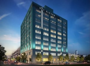 Modern teal building with many windows exterior at Sky Eleven in Springfield Student Accommodation