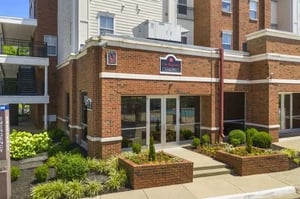Building entrance with landscaping exterior at Registry Apartments in Bowling Green Student Accommodation