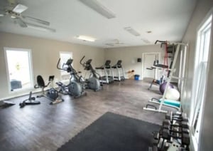 Gym equipment including treadmills ellipticals and weights gym at Ashley Oaks Apartments in Morgantown Student Accommodation