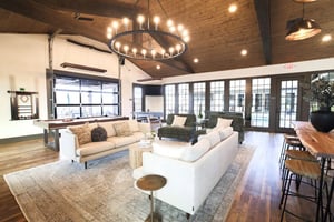 Sofas pool table and bar area living room at Maverick Hills in Central Student Accommodation