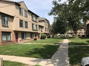 Apartment buildings with grassy yards exterior at Chip Village in Mount Pleasant Student Accommodation