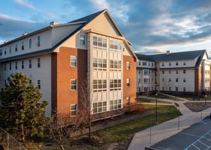 Apartment building with brick and siding exterior exterior at Broad Street Commons in Plattsburgh Student Accommodation