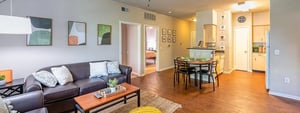 Sofa coffee table and dining set Living room at 58 West - Lease by Bed Available in Kalamazoo Student Accommodation