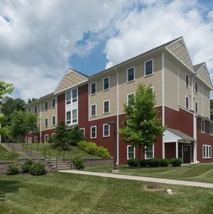 Student housing building with stairs and lawn exterior at East Village at WCU in West Chester Student Accommodation