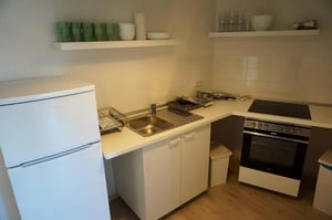 White refrigerator oven stove and shelves kitchen at Room in Koloniestraße, 13357 Berlin, Germany in Berlin Student Accommodation