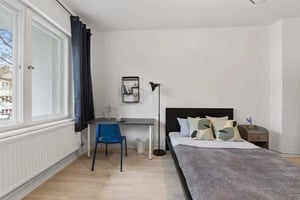 Bed desk chair mirror hangers bedroom at Zimmer in der Friedrichsbrunner Straße 44 in Berlin Student Accommodation