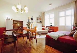 Dining table sofa bed with artwork living room at Apartment in Wedekindstraße 24, 10243 Berlin, Deutschland in Berlin Student Accommodation