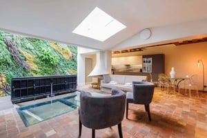 Sofa chairs glass floor living kitchen exterior at Apartment in 6 Rue des Lions Saint-Paul, 75004 Paris, France in Paris Student Accommodation