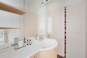 White sink chrome faucet and toiletries bathroom at Apartment in 18 Rue St Charles, 75015 Paris, France in Paris Student Accommodation
