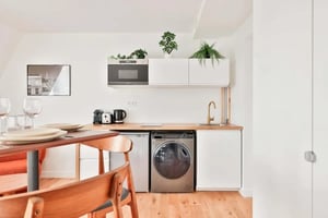 Microwave kettle washer sink and dining table kitchen at Studio in 184 Av. Victor Hugo, 75016 Paris, France in Paris Student Accommodation