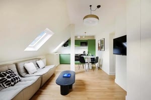 Sofa kitchen table and chairs living room at Apartment in 37 Rue de l'Abbé Grégoire, 75006 Paris, France in Paris Student Accommodation