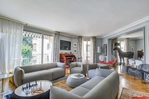 Gray sofas with desk and horse statue living room at Apartment in Av. Foch, 75016 Paris, France in Paris Student Accommodation