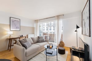 Sofa coffee table art lamp balcony living room at Apartment in 9 Rue Basfroi, 75011 Paris, France in Paris Student Accommodation