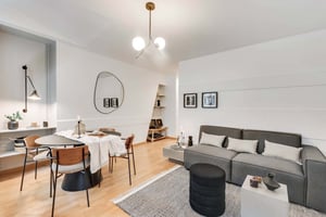 Dining table chairs sofa rug living room at Apartment in 25 Rue Montorgueil, 75001 Paris, France in Paris Student Accommodation