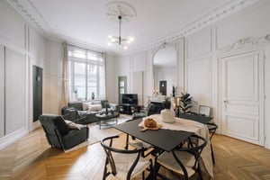 Sofa chairs dining table television living room at Apartment in 9 Rue de Lota, 75016 Paris, France in Paris Student Accommodation