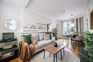 Sofa coffee table rug turntable dining set living room at Apartment in 41 Rue Faidherbe, 75011 Paris, France in Paris Student Accommodation