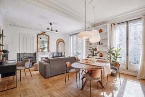 Sofa dining table chairs plants mirror living area at Apartment in 198 Boulevard de Charonne, 75020 Paris, France in Paris Student Accommodation