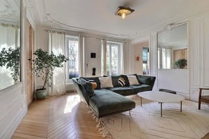 Green sectional sofa oval marble coffee table living room at Apartment in Rue Beaurepaire, 75010 Paris, France in Paris Student Accommodation