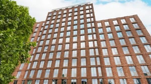 Red brick student accommodation building with many windows Exterior at Press House in London Student Accommodation