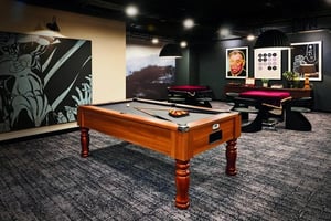 Pool table artwork and seating area playing area at Vita Student Portland Crescent in Leeds Student Accommodation