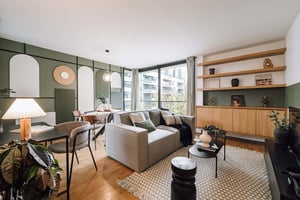 Sofa dining table and study desk living room at Apartment in 11 Rue George Bernard Shaw, 75015 Paris, France in Paris Student Accommodation