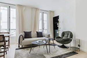 Sofa armchair coffee tables rug living room at Apartment in 6 Rue de Chevreuse, 75006 Paris, France in Paris Student Accommodation