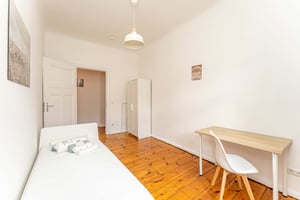 White bed desk and wardrobe interior bedroom at Room in Bornholmer Str. 17, 10439 Berlin, Germania in Berlin Student Accommodation