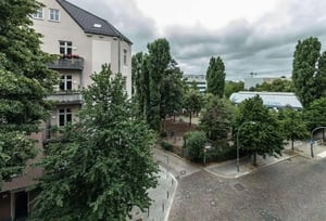 Building with balconies and trees exterior at Apartment in Seumestraße, 10245 Berlin-Bezirk Friedrichshain-Kreuzberg, Germany in Berlin Student Accommodation