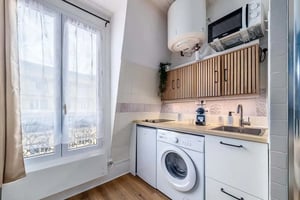 Washing machine microwave sink cabinets kitchen area at Studio in 8 R. du Château Landon, 75010 Paris, France in Paris Student Accommodation