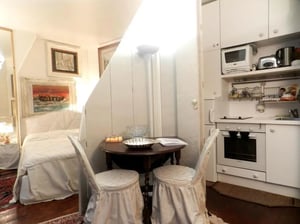 Bed table kitchen and bedroom at Apartment Studio 31m² in Paris Student Accommodation