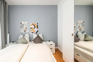 Two beds wall art bedside tables Bedroom at Apartment in Seumestraße, Berlin for 48 m² with 1 bedroom in Berlin Student Accommodation