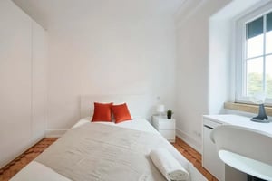 Bed desk white wardrobe and desk Bedroom at Bedroom in a 6-Bedroom Apartment in Rua Gorgel do Amaral, Lisbon - Room 1 in Lisbon Student Accommodation