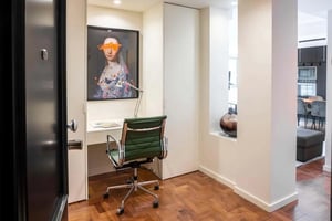 Desk chair artwork and desk study area at Apartamento T2 nas Avenidas Novas – 3C Conforto Sofisticado e com Serviços in Lisbon Student Accommodation