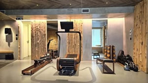 Treadmill rowing machine dumbbells weight rack gym area at Lisbon Deluxe Apartment in Lisbon Student Accommodation