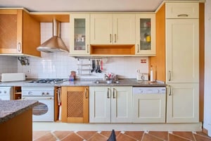Kitchen cabinets sink stove dishwasher kitchen at Apartment in premium location , Lisbon in Lisbon Student Accommodation