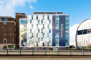 Modern building facade with many windows exterior at Lucas Studios in Birmingham Student Accommodation