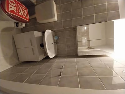 Toilet sink cabinet mirrored cabinet bathroom at Bright 1-bedroom apartment close to the Richard-Wagner-Platz metro station in Berlin Student Accommodation