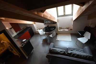 Couch kitchen table chairs and sofa living room at Great-looking studio near Università degli Studi di Torino in Turin Student Accommodation