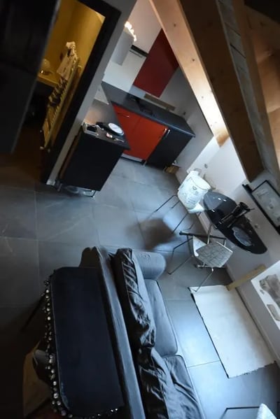 Sofa kitchen table chairs and rug living area at Great-looking studio near Università degli Studi di Torino in Turin Student Accommodation