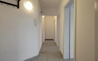 Hallway with coat rack and intercom hallway at Elegant single bedroom near Bad Cannstatt train station in Stuttgart Student Accommodation