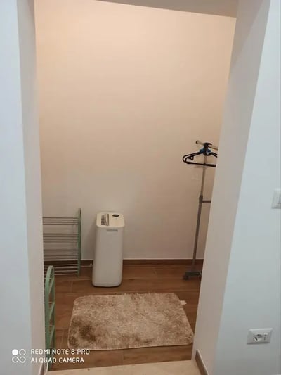 Shoe rack dehumidifier rug and clothes rack closet at Studio in Rome in Rome Student Accommodation