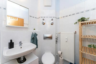Sink toilet radiator shelving bathroom at Very cosy single bedroom in Stern in Potsdam Student Accommodation