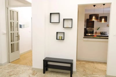 Black bench three shelves open kitchen exterior at Very cosy single bedroom near Parco dell'Acqua in Brescia Student Accommodation