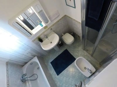 Bathtub toilet sink bidet shower Bathroom at Delightful single bedroom in Crocifissa di Rosa in Brescia Student Accommodation