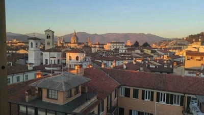 Rooftops and church towers city view exterior at Spacious single bedroom near the Brescia train station in Brescia Student Accommodation