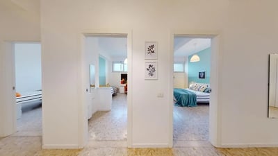Beds framed art pictures and paintings bedroom at Very nice single bedroom near Facoltà di Medicina e Chirurgia in Brescia Student Accommodation
