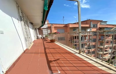 Balcony with tiled floor and buildings exterior at Single Bedroom in a 3-Bedroom Apartment in Rome in Rome Student Accommodation
