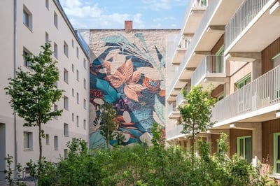 Large floral mural building exterior with balconies exterior at Cosy single bedroom near Beusselstraße train station in Berlin Student Accommodation