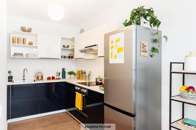 Modern L-shaped kitchen with stainless steel fridge kitchen at Single bedroom in a 4 bedroom apartment in Moabit in Berlin Student Accommodation