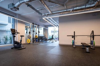 Exercise bike weights rack bench press gym at Coleman Court in Cork Student Accommodation
